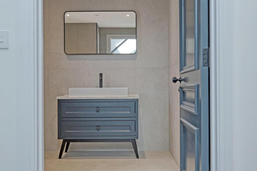 Painted bespoke bathroom vanity unit with two drawers